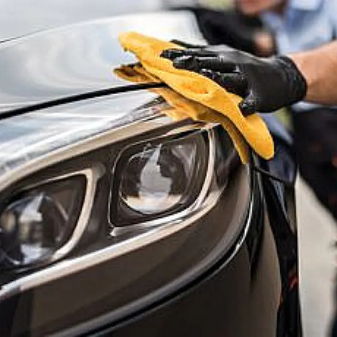 Professional headlight restoration service at TDM