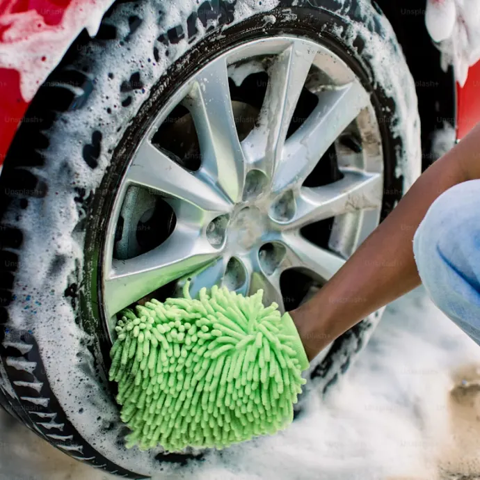 Car foam wash thick foam covering vehicle